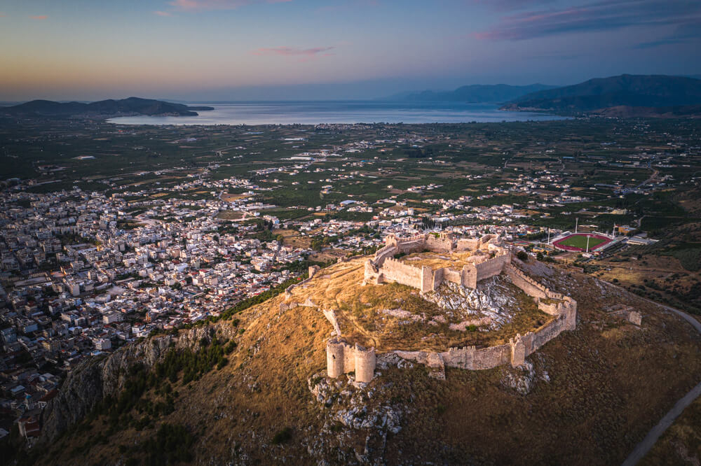 Argos: A bird’s eye view of a large fortress and the sprawling city below