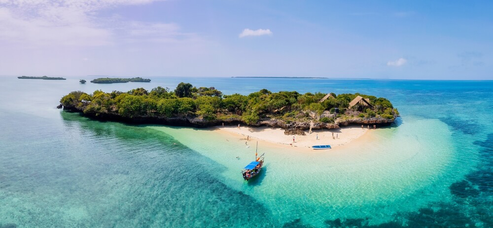 Relaxing holiday destinations: A bird’s eye view of an island beach in Zanzibar