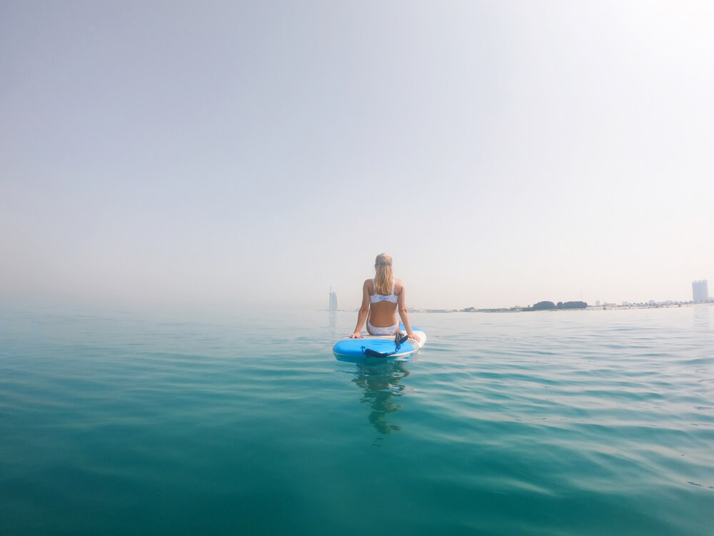 Stand-up paddleboarding on calm waters