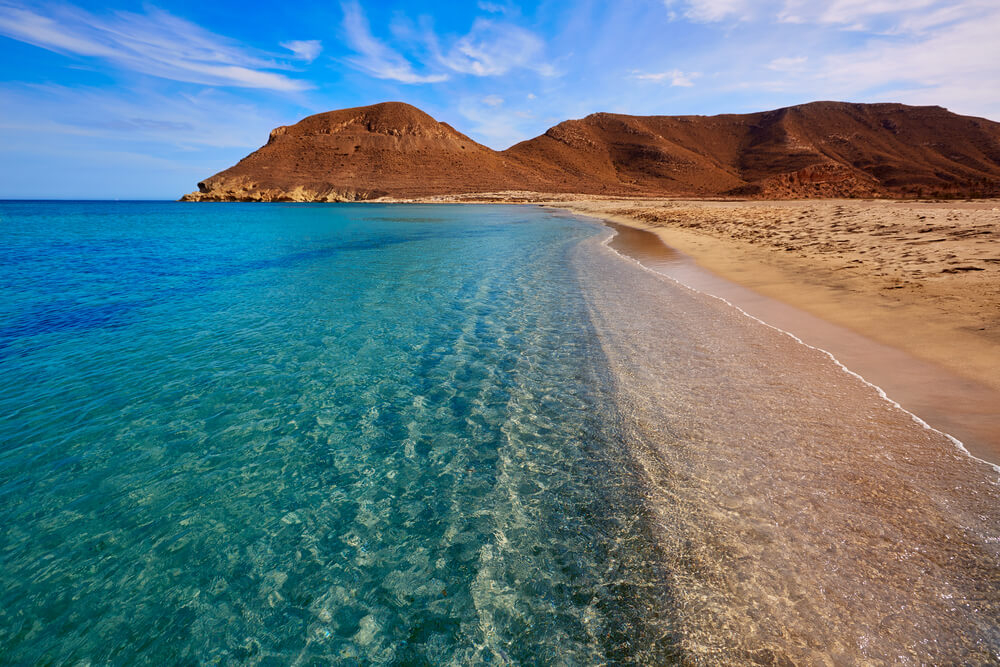 Romantic getaways in Spain: a pristine golden sand beach in Cabo de Gata