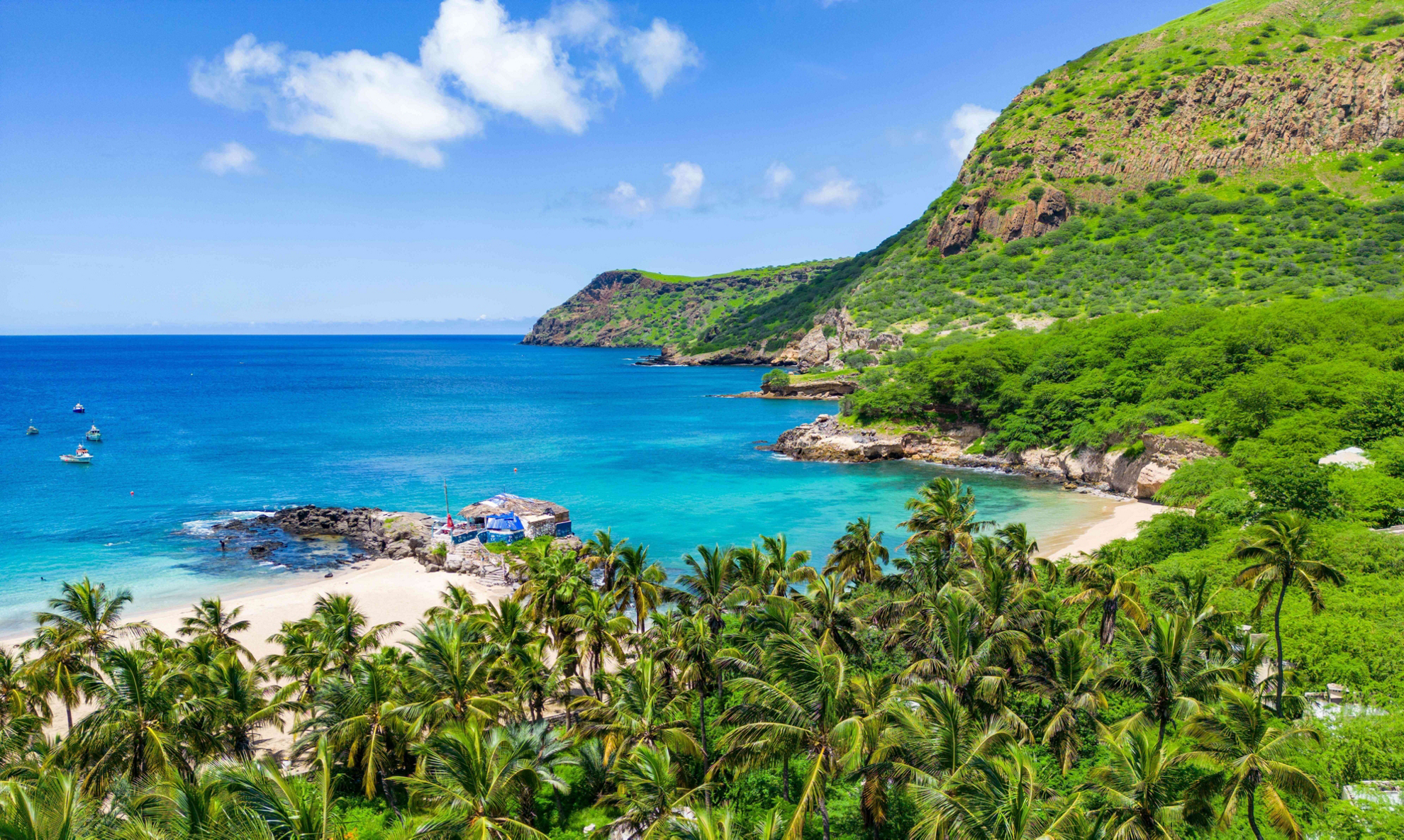 Santiago, Cape Verde: White sand, blue sea surrounded by palm trees