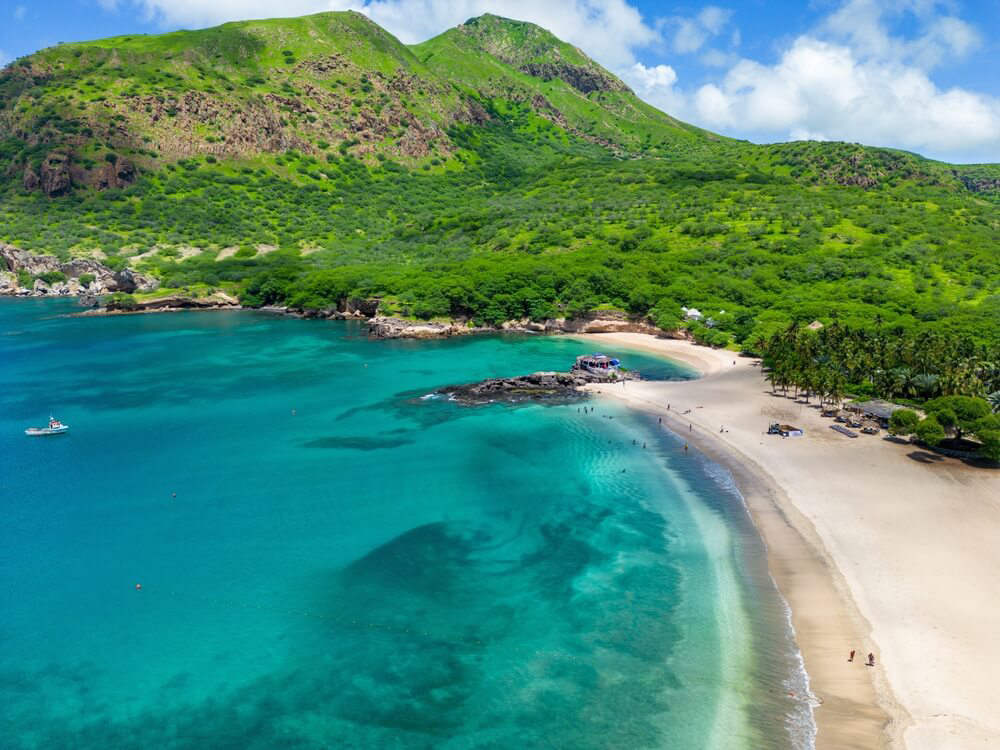 Tarrafal Beach: Bird’s eye view of golden sand, blue sea and green mountains