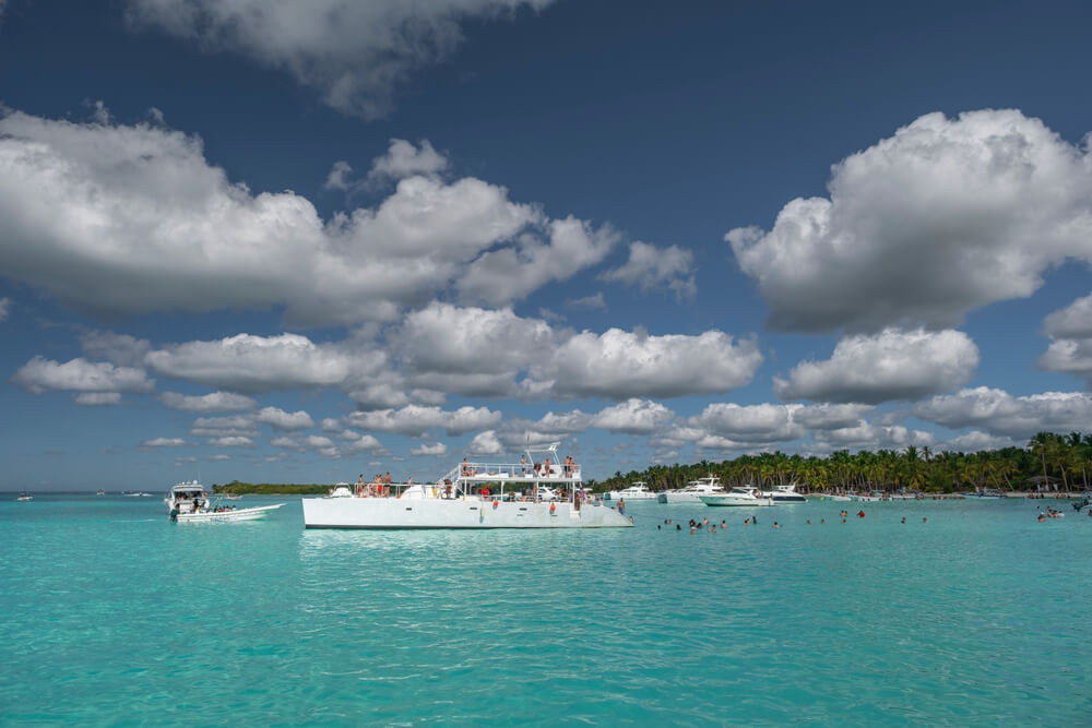 An Isla Saona catamaran tour makes a swim stop on the island’s shores.
