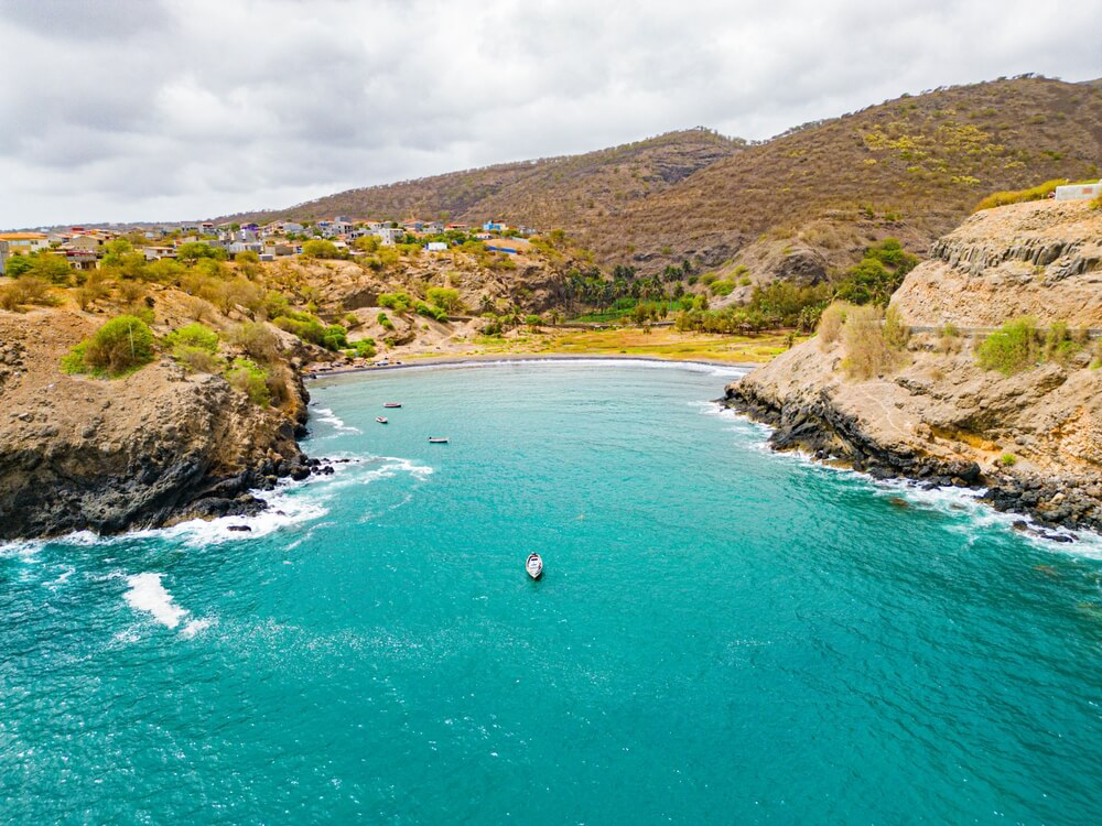 Porto Formoso: A drone shot of a turquoise blue ocean and volcanic landscape