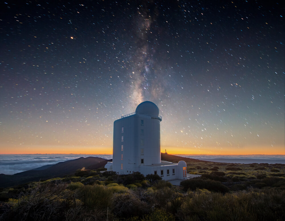 Tenerife Observatory: The Tenerife Observatory with the night sky