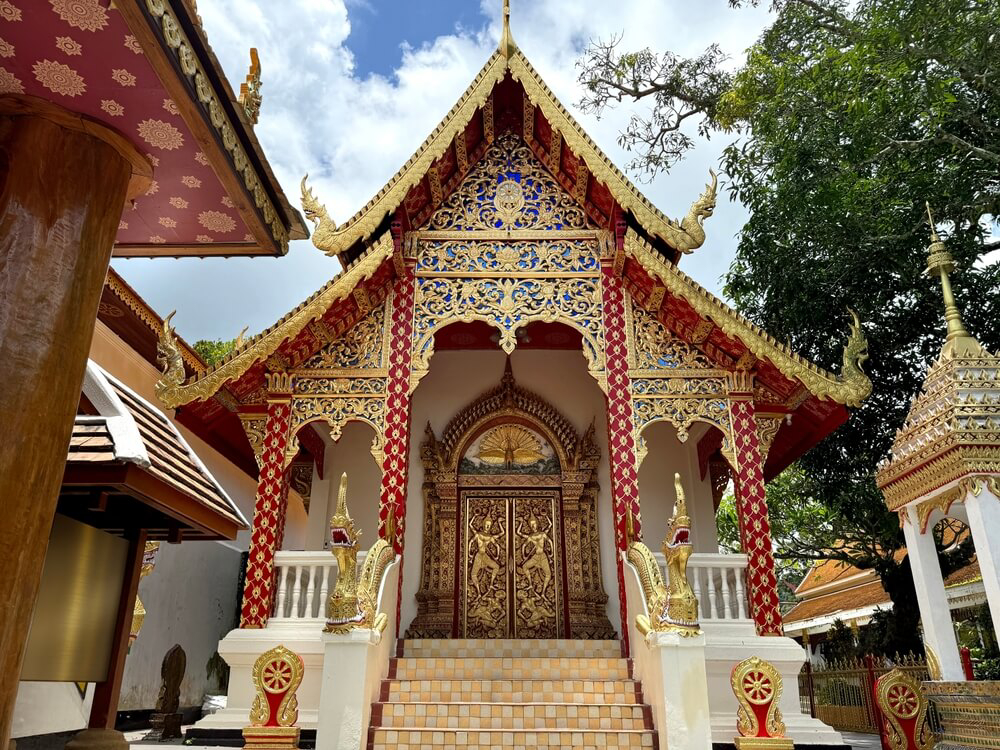 Temples in Thailand: A gold, red and blue painted temple