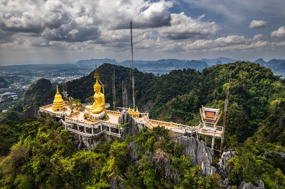 Wat Tham Suea: A temple set in the mountain with a tall golden Buddha