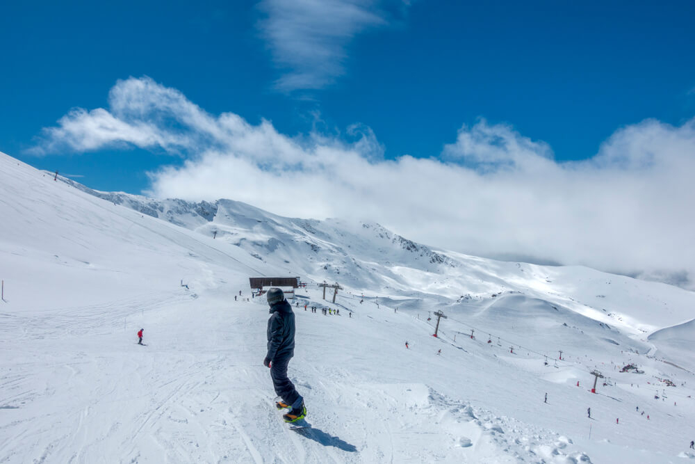 Sierra Nevada: Person skiing on the snowy mountains