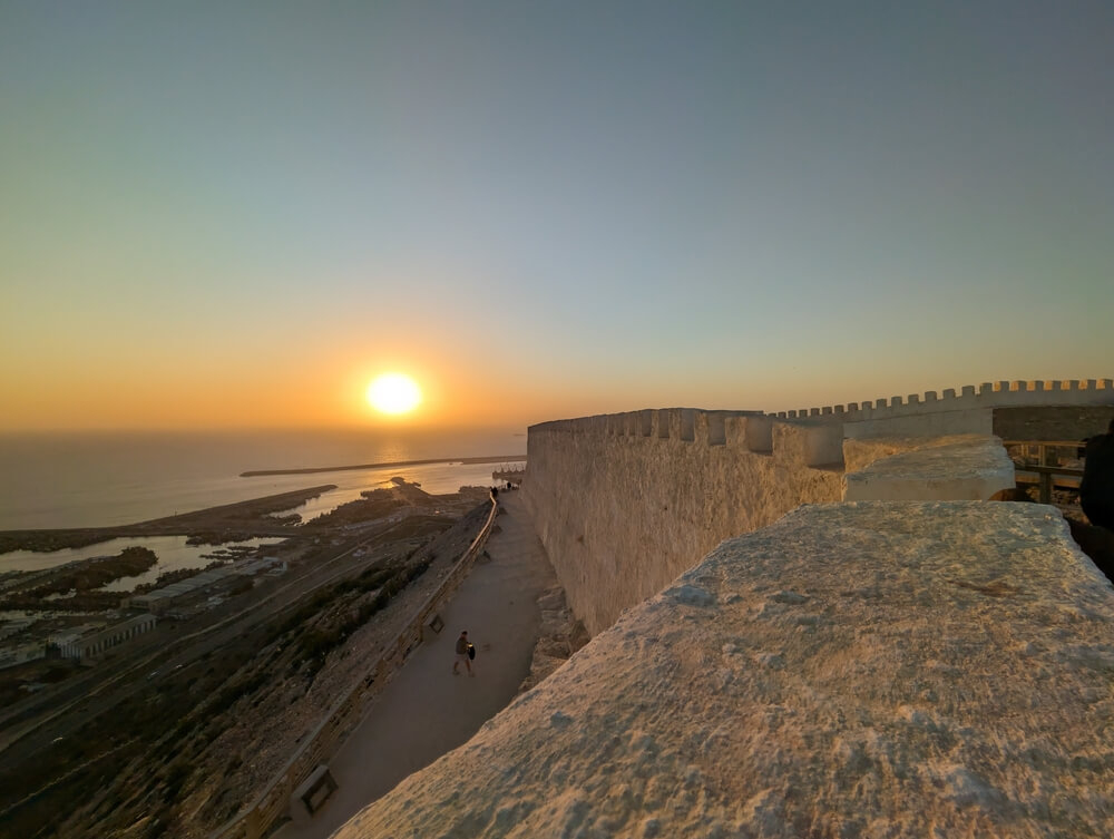 Kasbah: White stone walls see from above at sunset