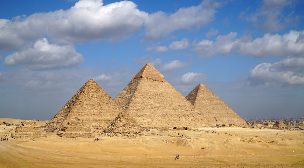 Things to do in Cairo: The three pyramids of Giza in the desert