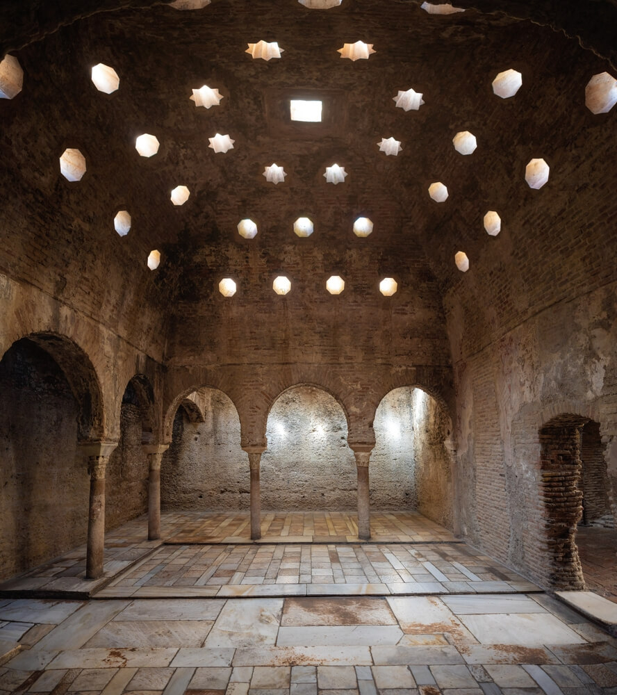 El Bañuelo: A stone-domed building with star skylights