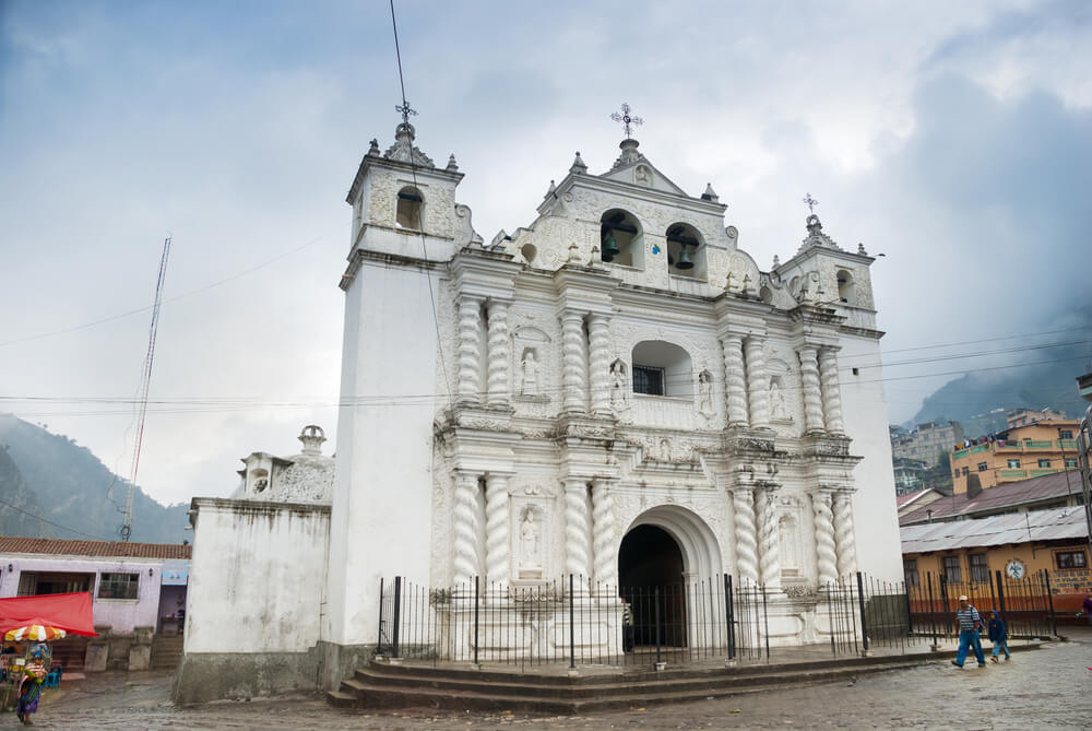 Places to visit in Guatemala: white ornate church in Quetzaltenango