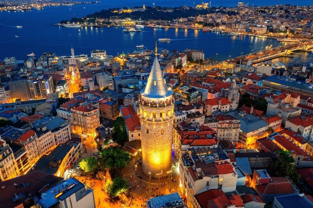 Things to do in Istanbul: Bird’s eye view of the Galata Tower lit up at night