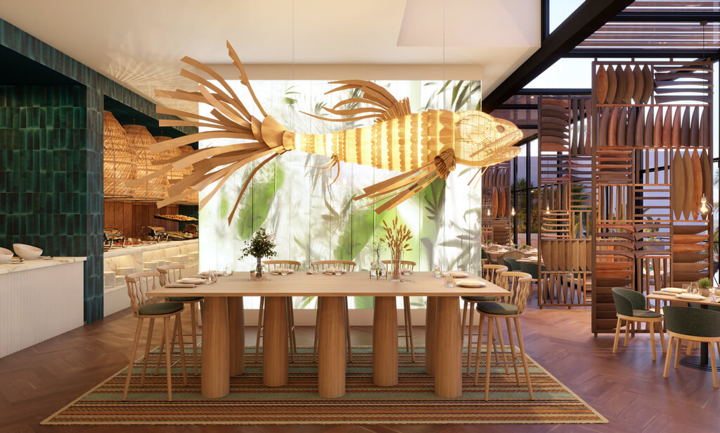 Male Hotel: A fish statue over a table in a restaurant