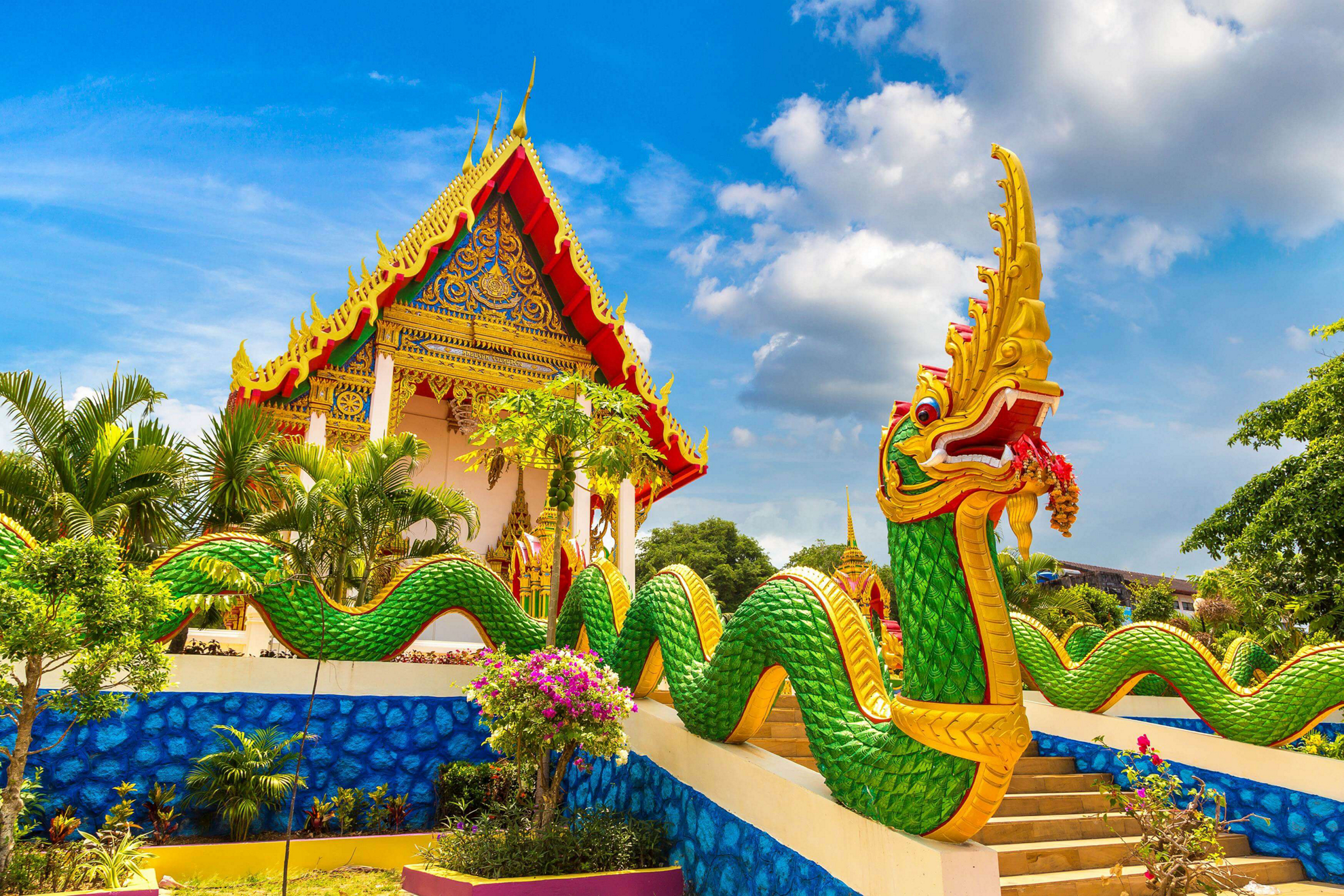 Things to do in Phuket: A traditional temple with two snake statues outside