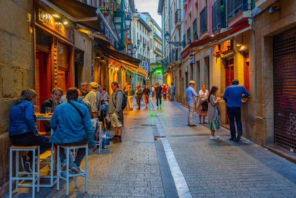 Things to do in San Sebastián: A typical street in the old town with bars
