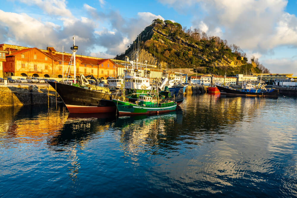 Getaria: A fishing port with sailing boats in the harbour