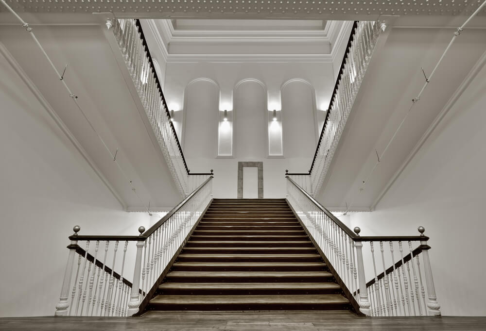 Tabakalera: A white hall with a grand staircase