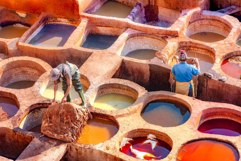 Chouara Tannery: Men working with leather at the Fez tannery