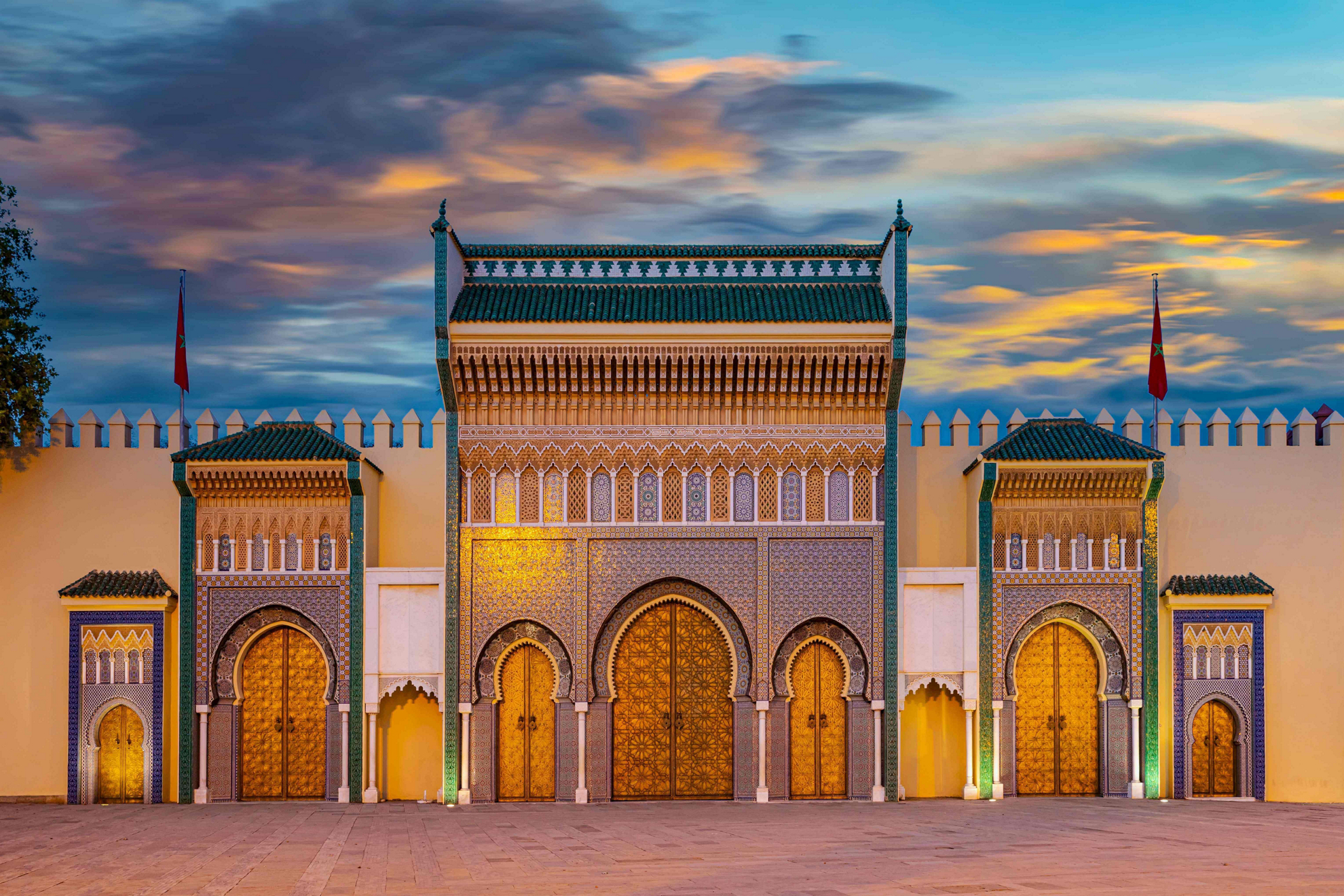 Things to see in Fez: An elaborate, mosaic covered building at dusk