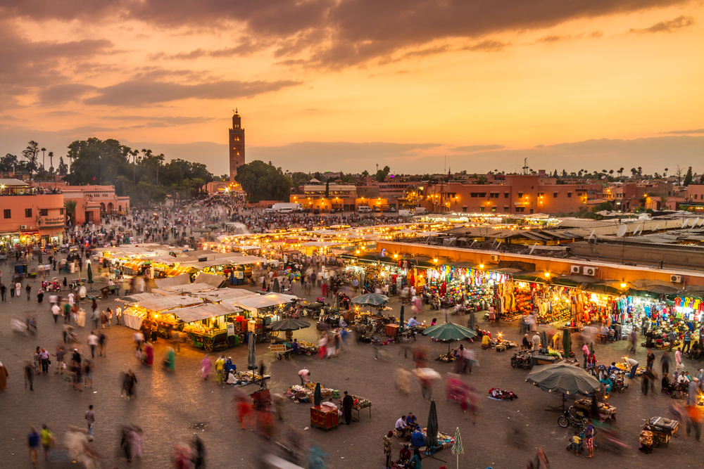 Jemaa el-Fnaa: A bird’s eye view of the square at dusk with crowds of people