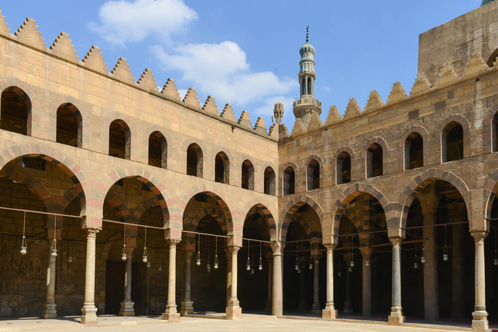 Cairo tourist attractions: Interior patio of the Al Nasir Mosque with archways and turrets 