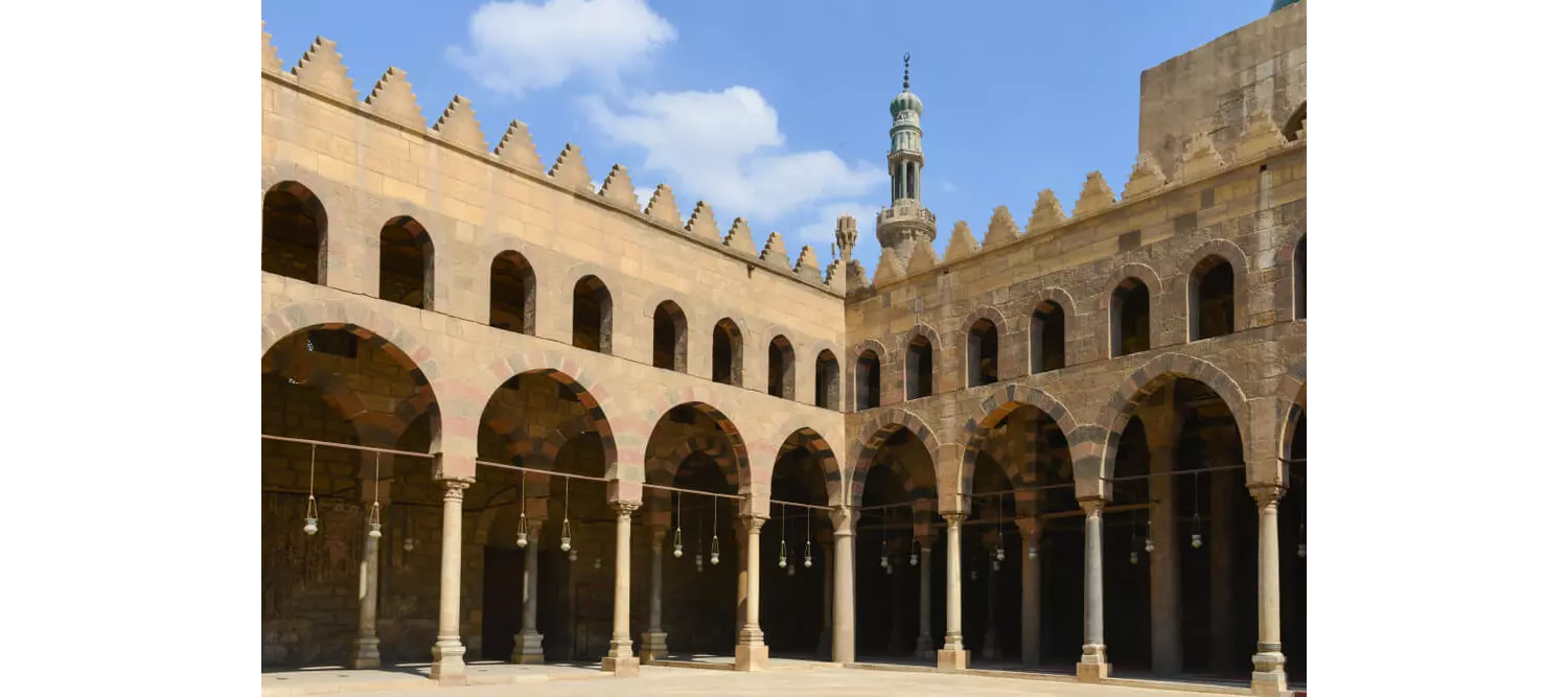 Cairo tourist attractions: Interior patio of the Al Nasir Mosque with archways and turrets 