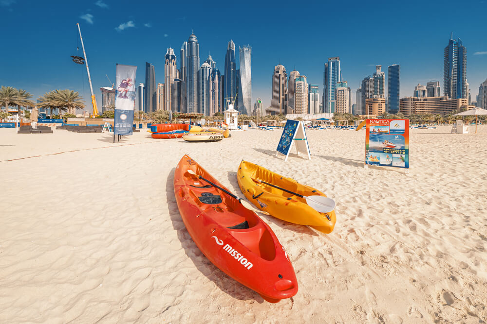 Kayak: Two kayaks on a white sand beach in Dubai