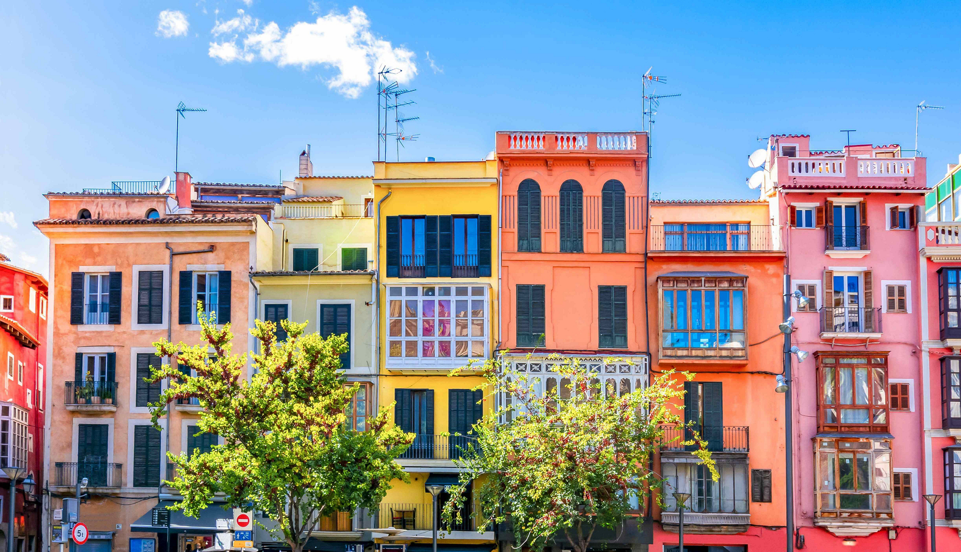 Weekend in Palma: A row of brightly coloured terraced buildings