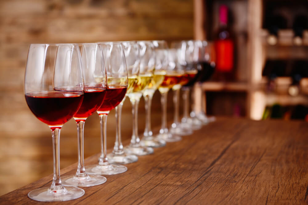 Wine-tours-in-Spain: A line of wine glasses on a table
