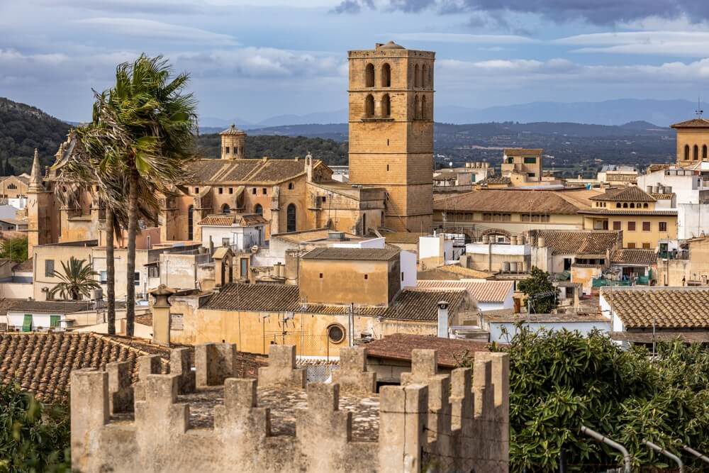 Felanitx: A traditional Felanitx skyline with old golden brick buildings