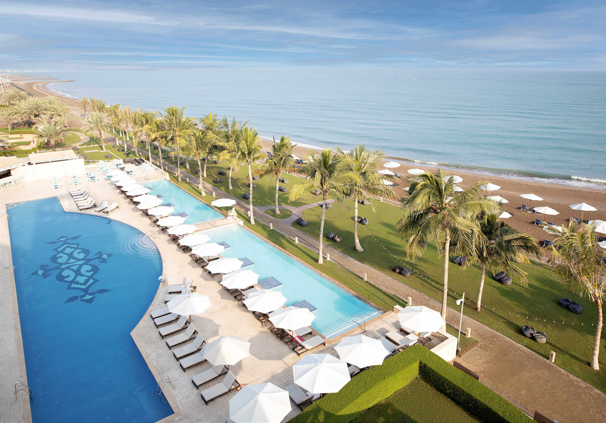Bahrain: The swimming pool and terrace of the Barceló Mussanah Resort