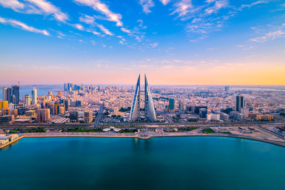 Manama: Pink sunset-hued skyline of Bahrain’s capital city