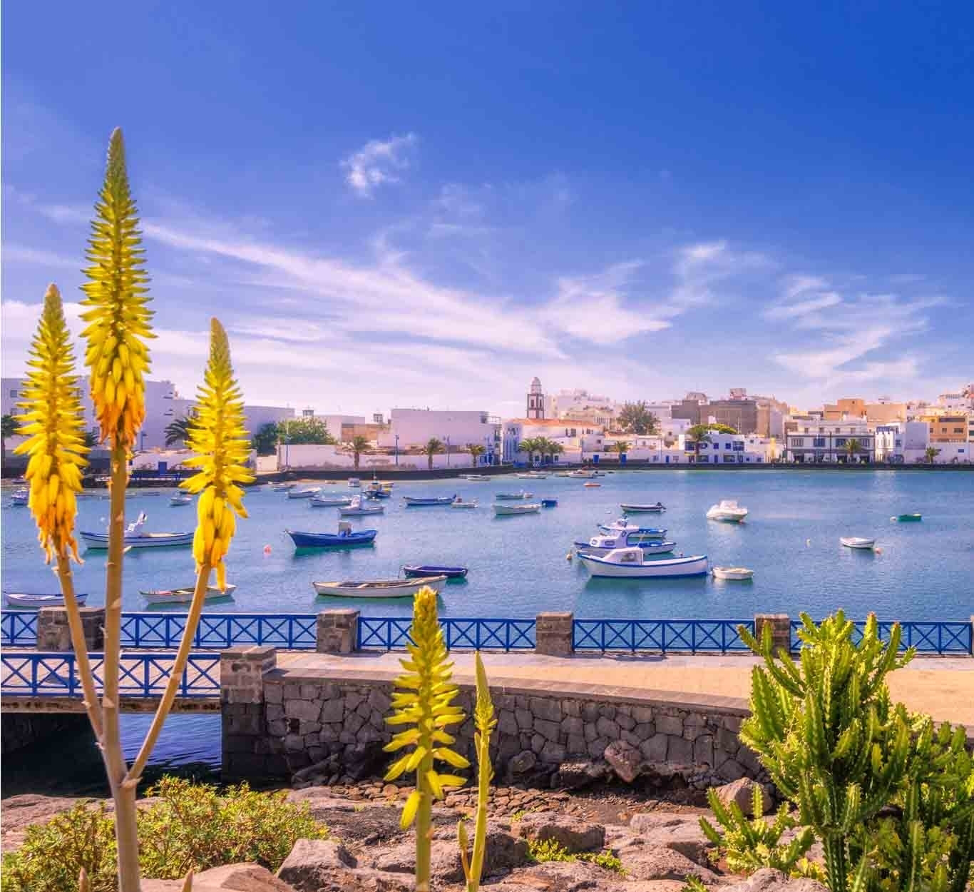 Things to do in Lanzarote: Red sunset with mountains in the background