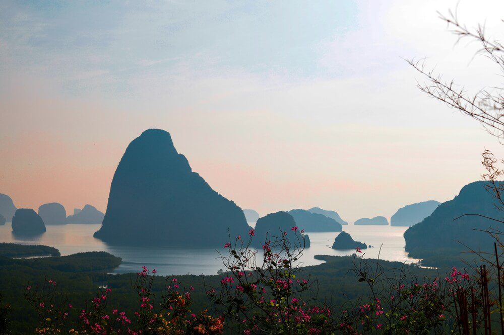 A colorful sunrise over Phang Nga Bay is a perfect start to a digital detox day.