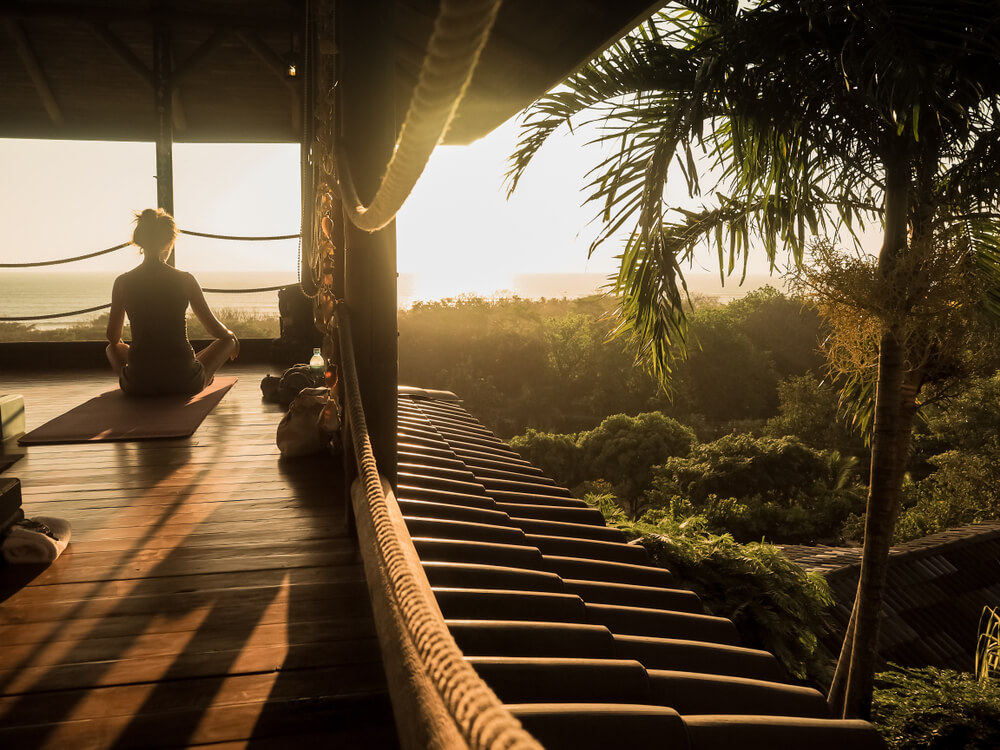 Meditate in the Costa Rican jungle during your digital detox vacation.