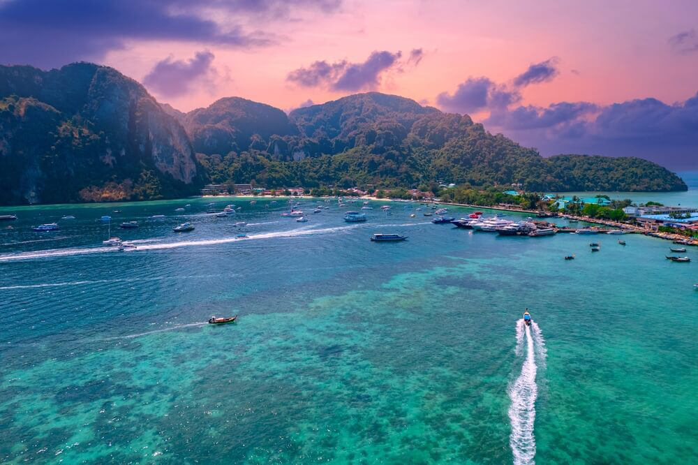 A water taxi brings guests to and from Coconut Island for unplugged vacations.