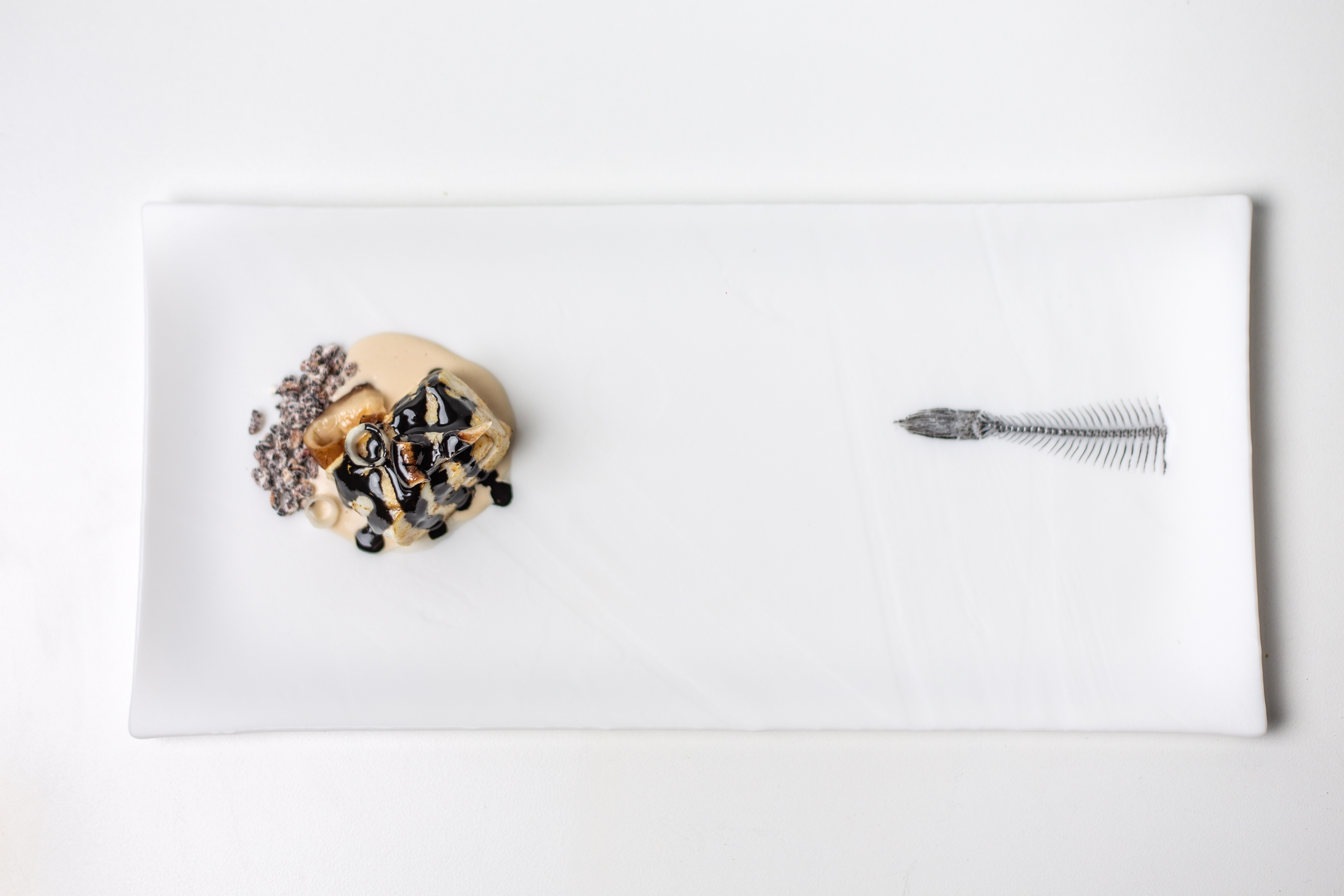 Stone bass with black sesame and white stone bass