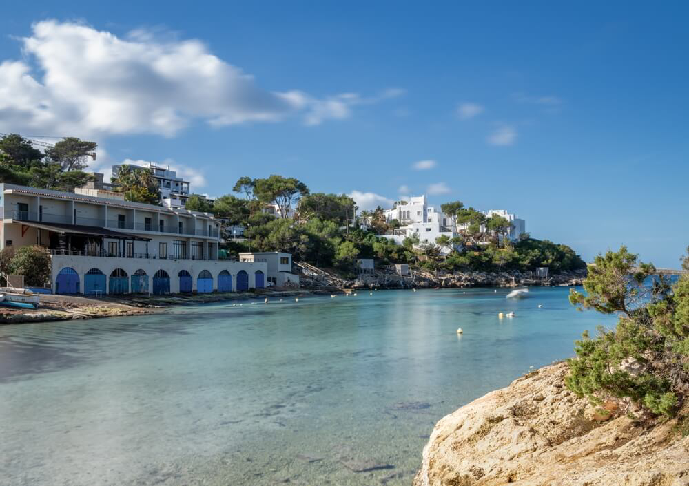 The crystal clear waters of the charming seaside village of Portinatx. 