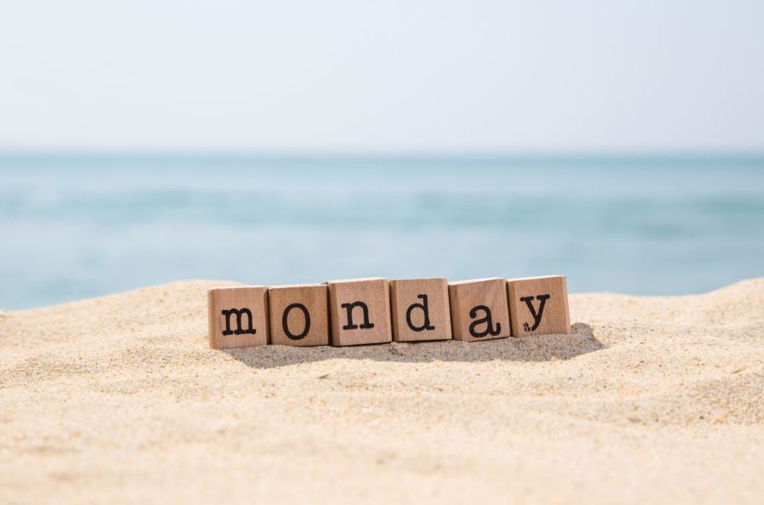 Blue Monday travel deals: Monday spelt with scrabble tiles on the sand
