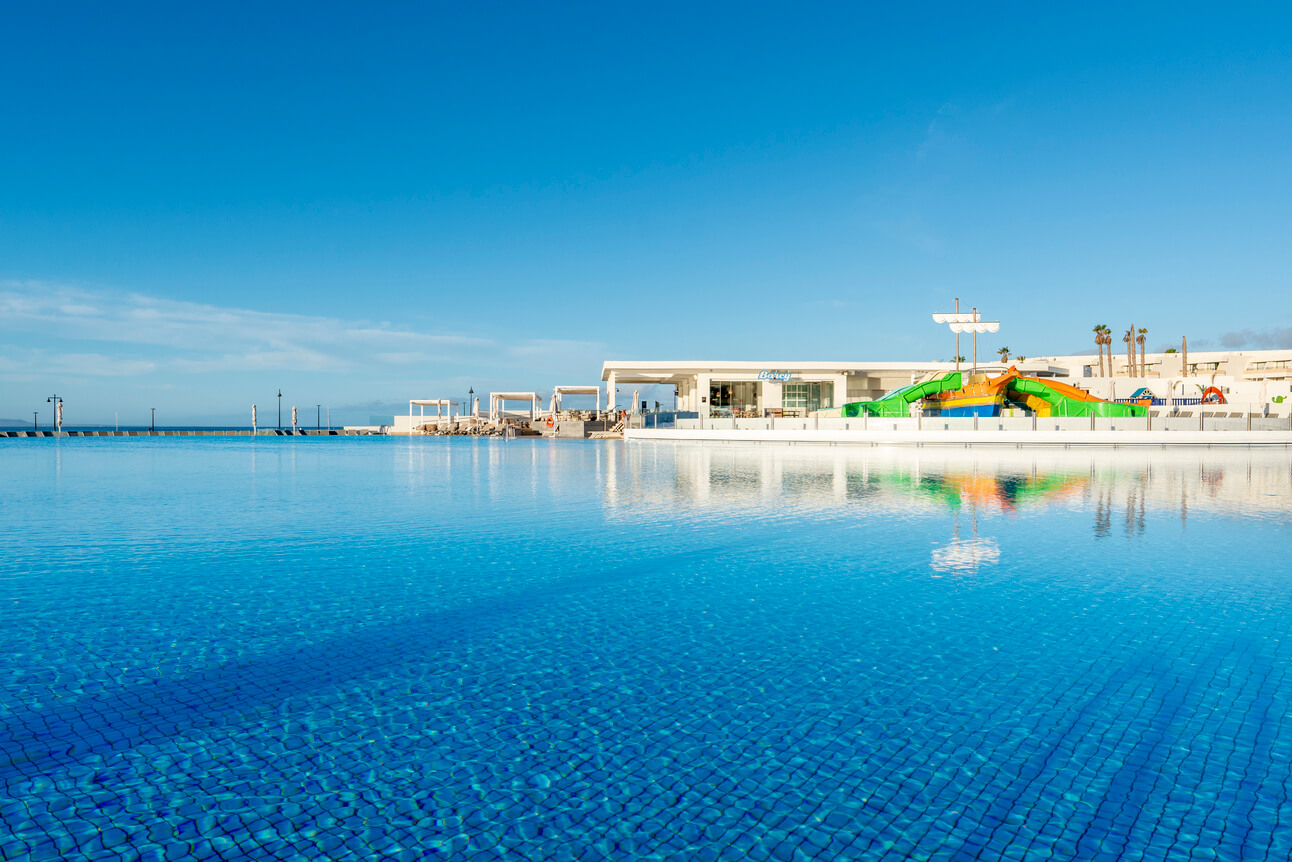 Barceló Playa Blanca: A view of the swimming pool and play slides at the Barcelo Playa Blanca hotel