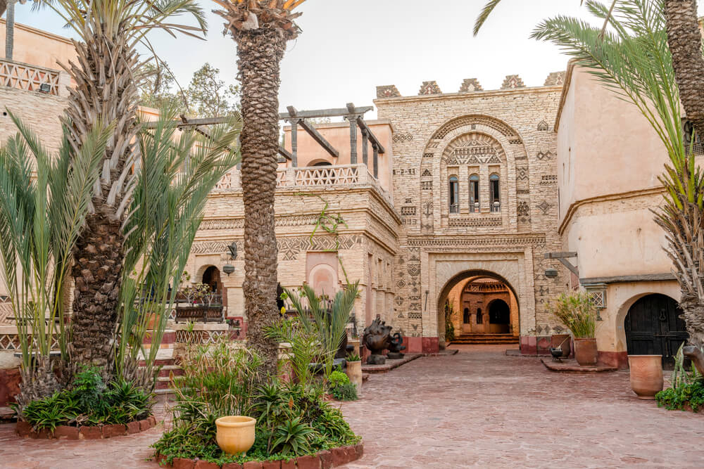 Medina of Agadir: The red stone alleyways of the Agadir Medina surrounded by buildings