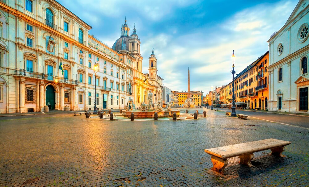 Navona Square: Black tiled square with an emblematic building in the background