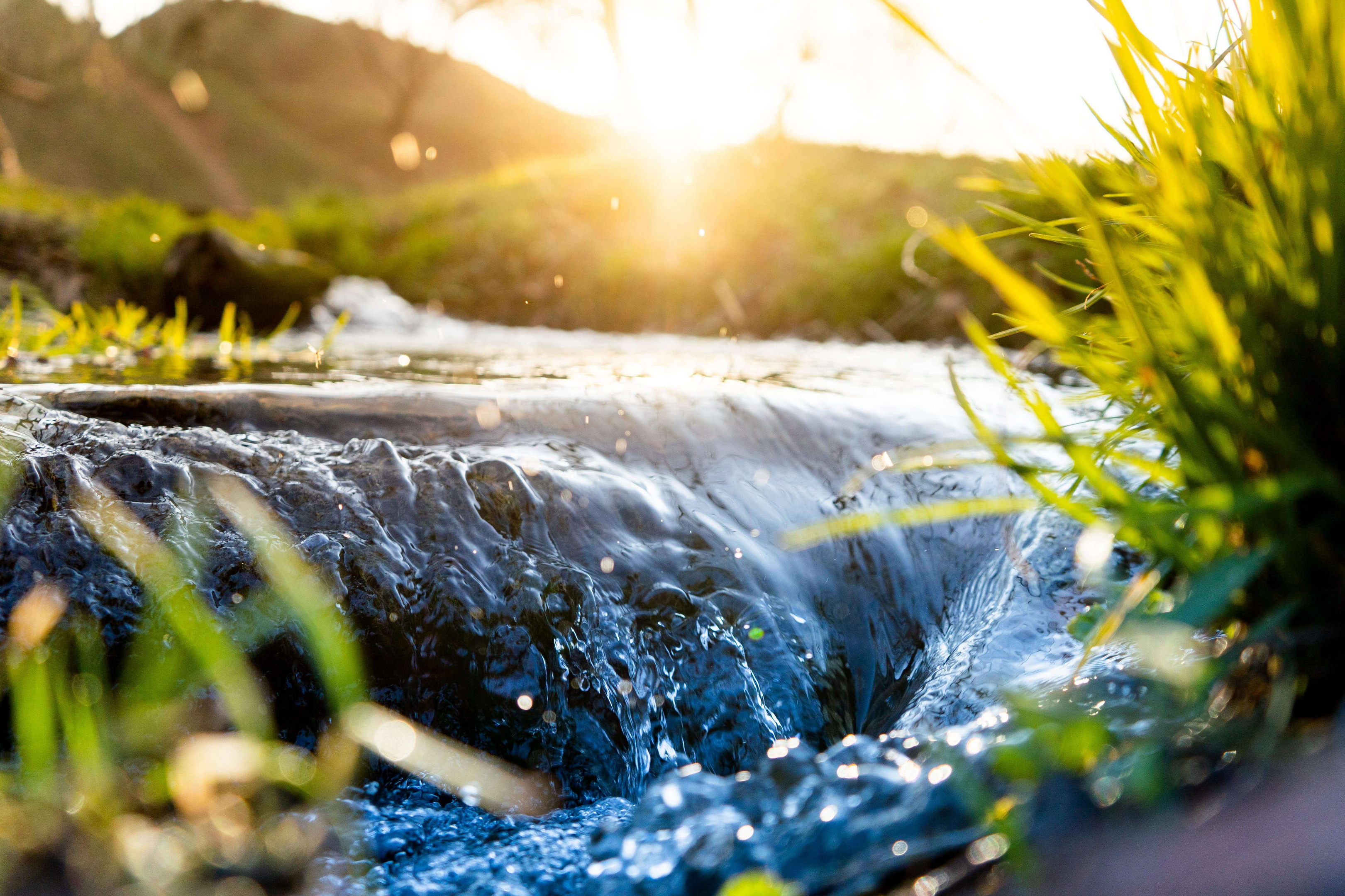 Hotels that care about saving water: water flowing in a weir 