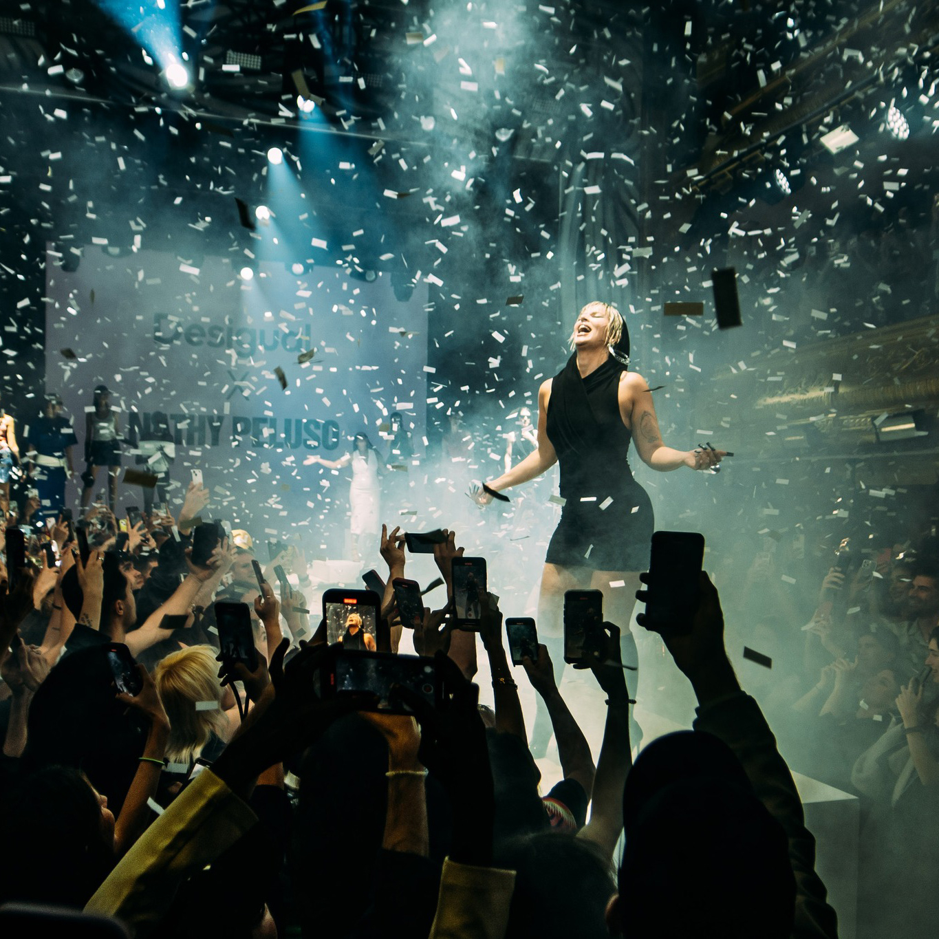 Joy Eslava Madrid: Nathy Peluso performing on stage in between a crowd