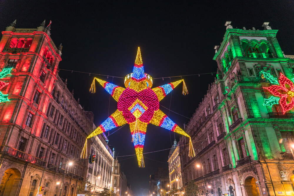 Mexican Christmas traditions: A 7 pointed piñata in a public street