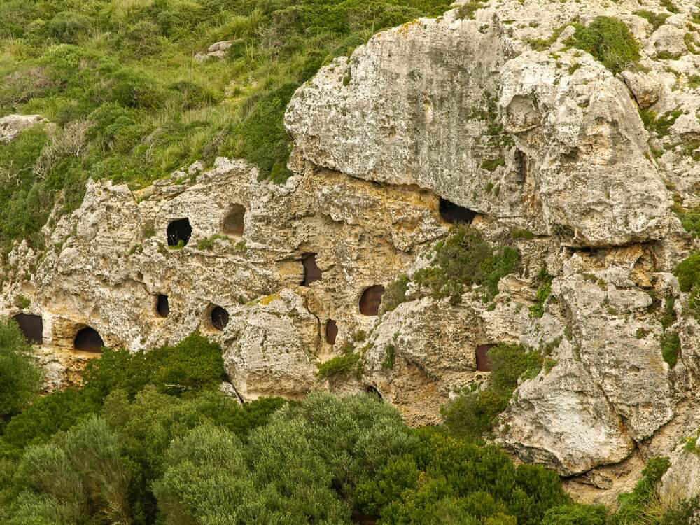 Calescoves Necropolis A close-up of the graves in the cliffs at Calescoves, Menorca