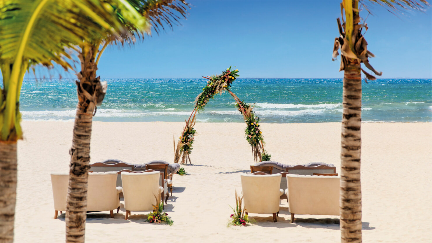 Royal Hideaway Playacar: white sand beach set up for a romantic gathering