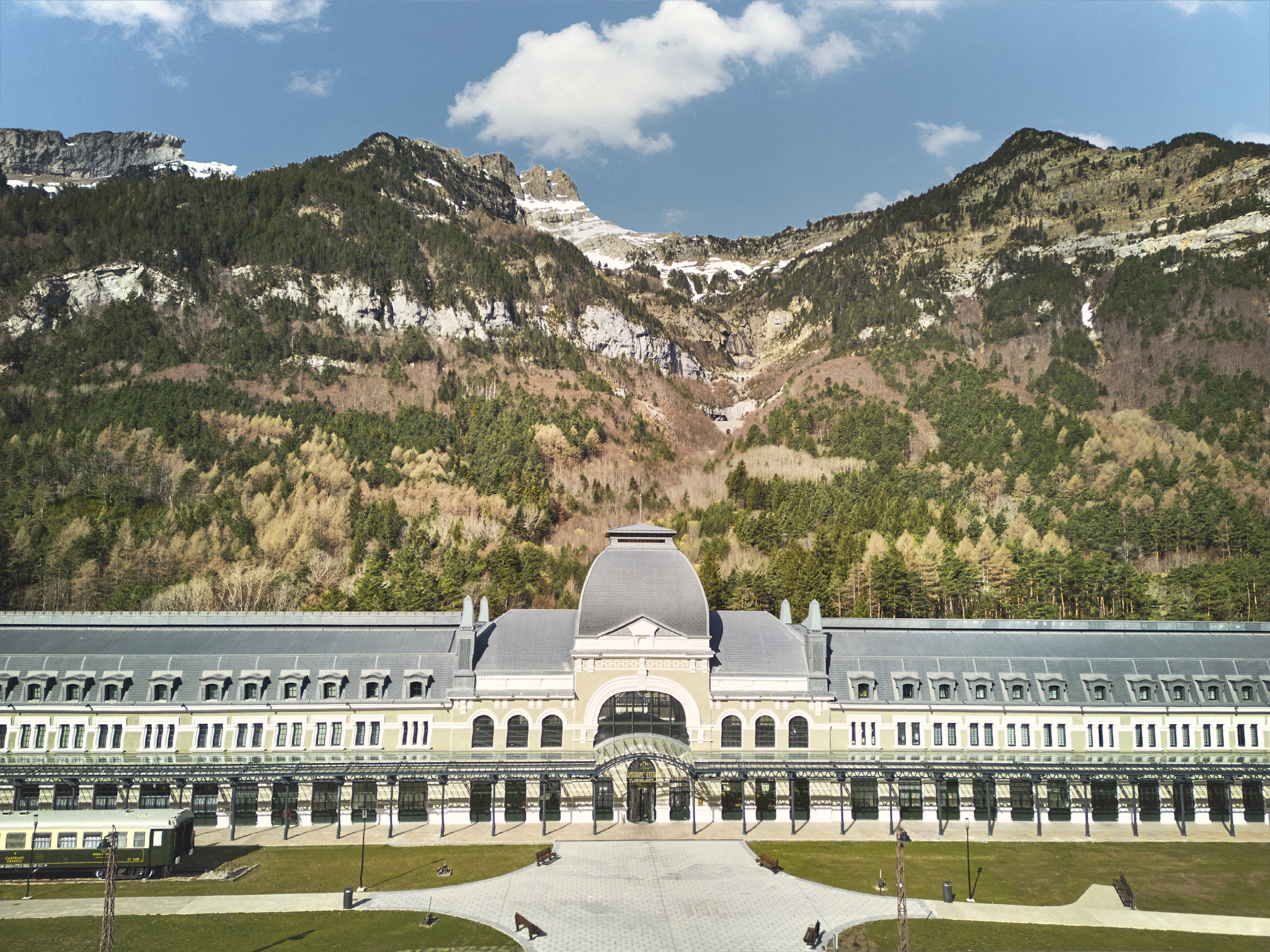 Hotel Canfranc: The green landscape of the Spanish Pyrenees with Canfranc Station