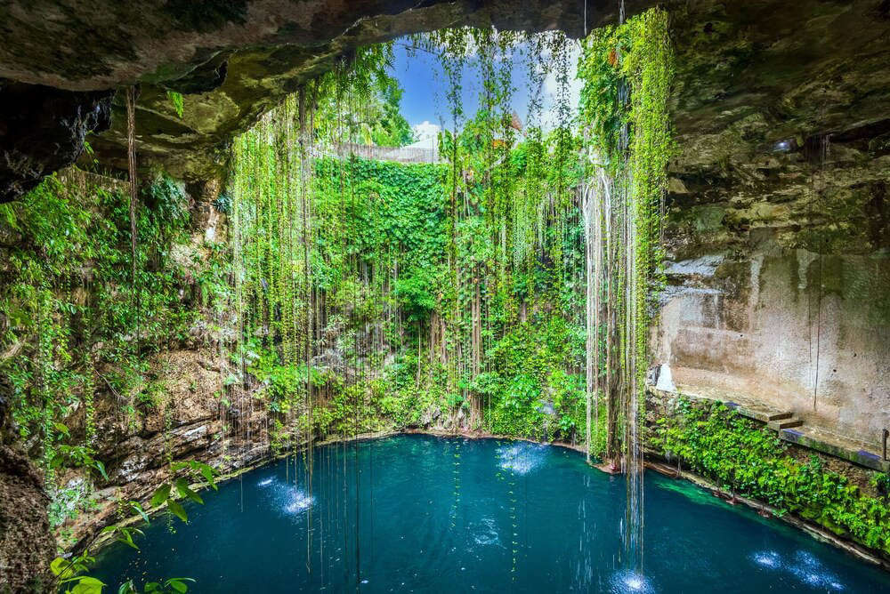 Celebrate Yellow Day in one of Cancún’s cenotes. 